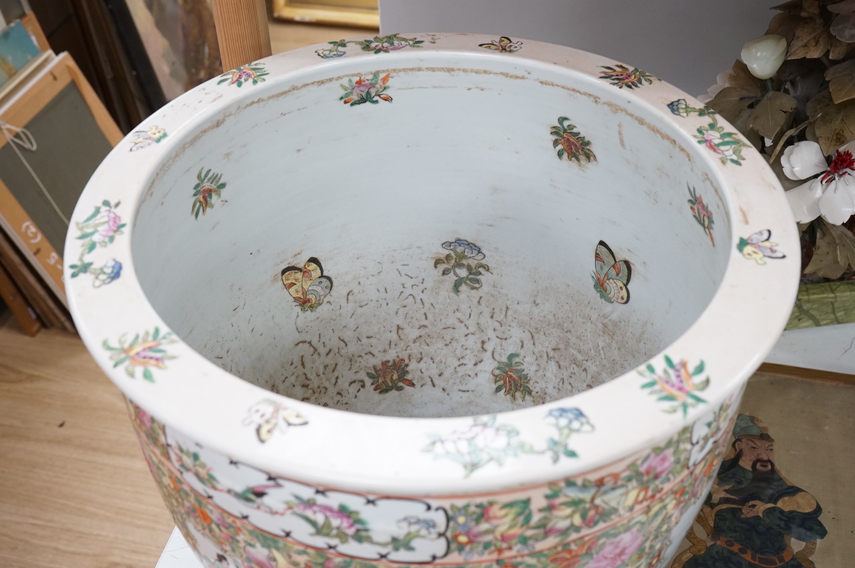 A Chinese famille Rose goldfish bowl enamelled with figures, butterflies and flowers, 41cm in diameter